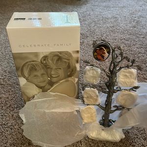 Medal frame in shape of tree.